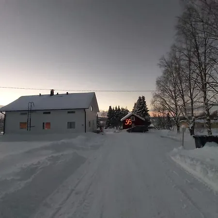 In A Big Wooden Home, Kotimajoitukset Muonio